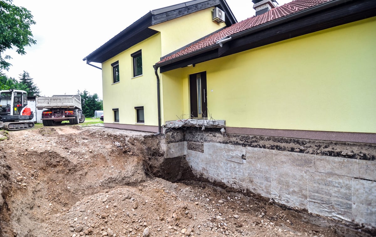 Home rebuild with excavator